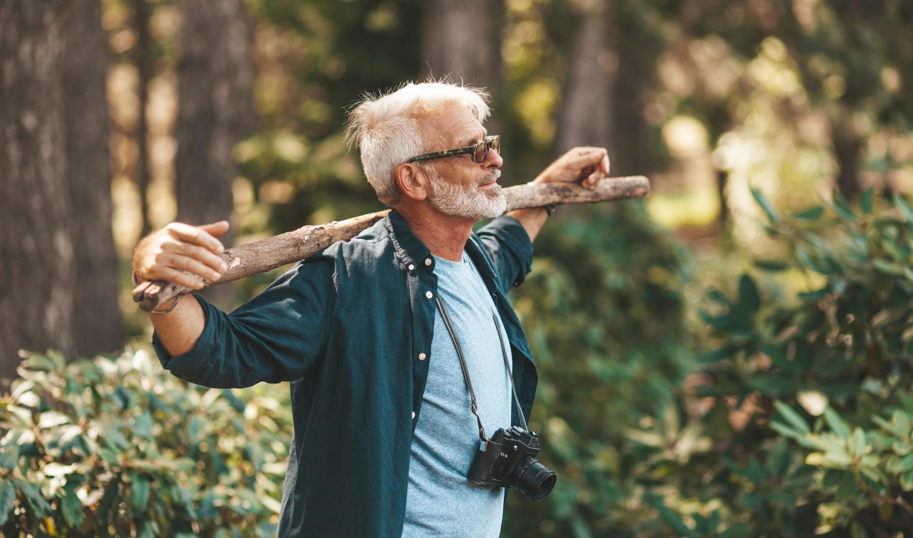 a man holding a log