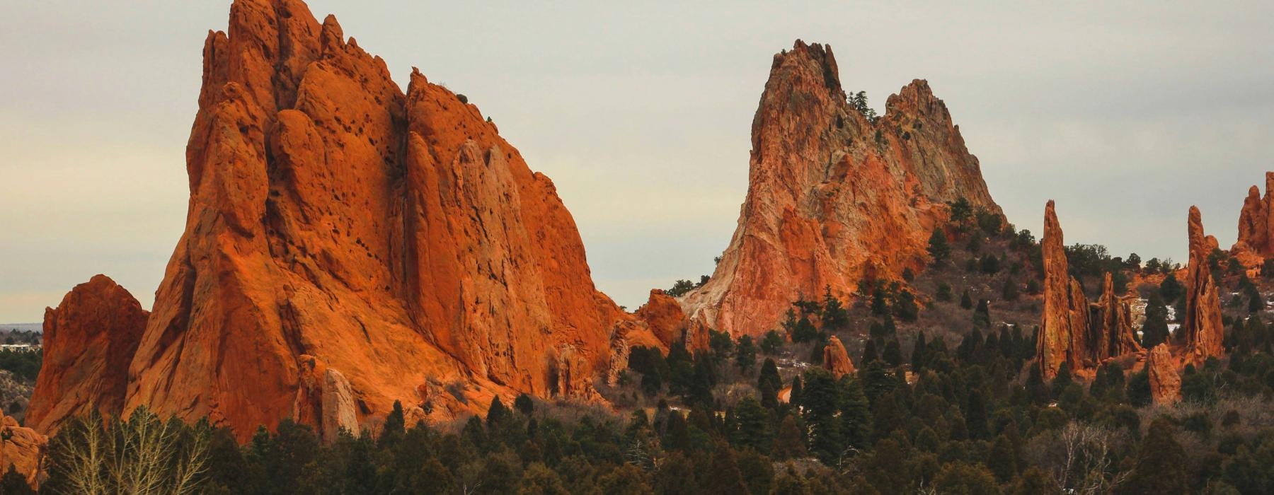 a group of tall red rock formations