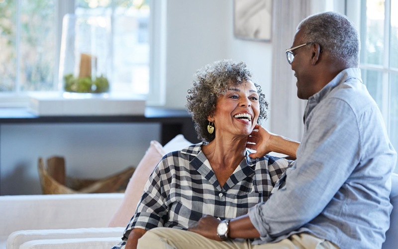 man and woman laughing