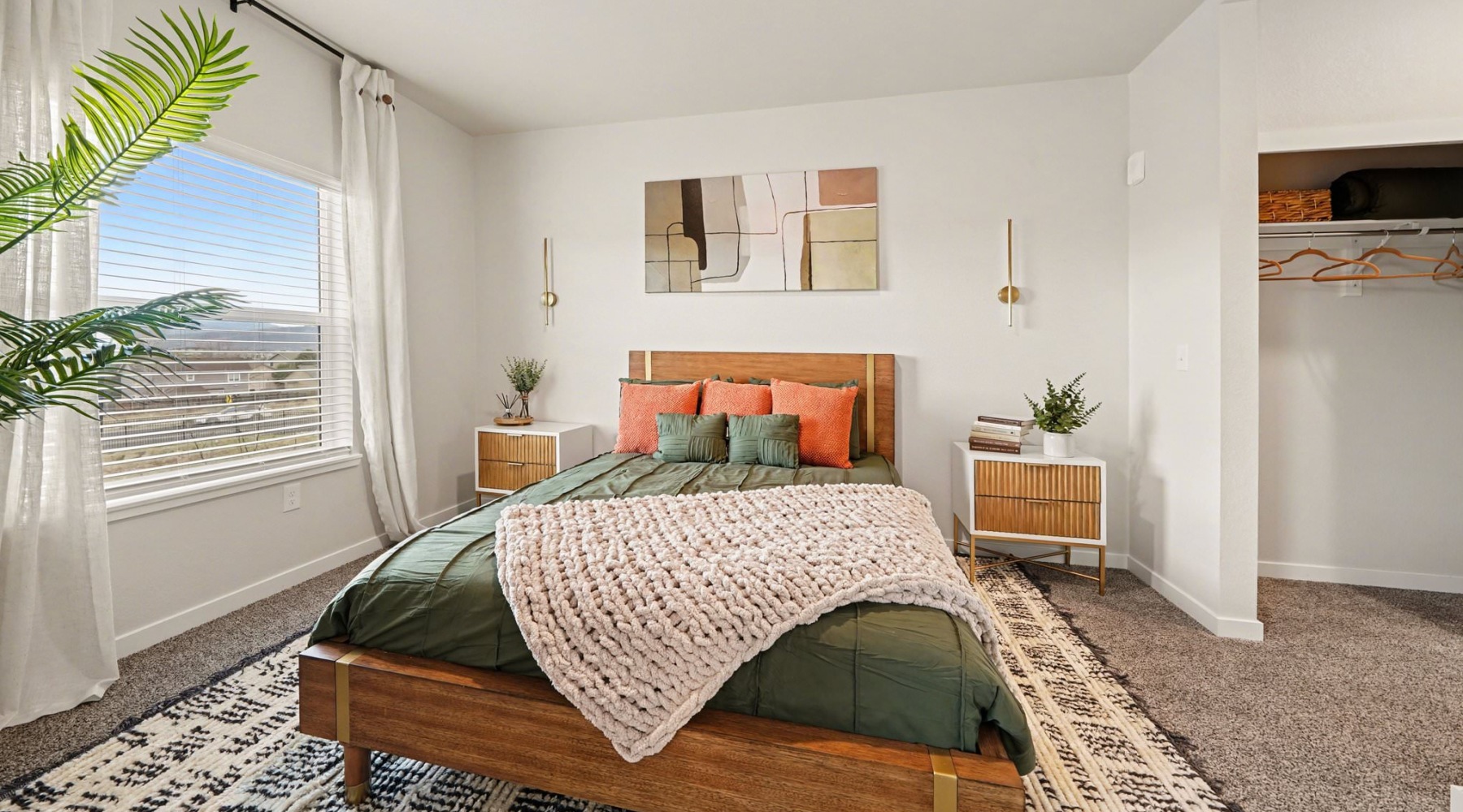 bedroom with bed and large window