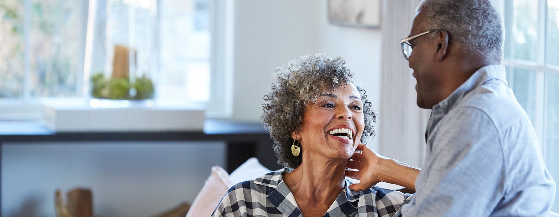 man and woman laughing